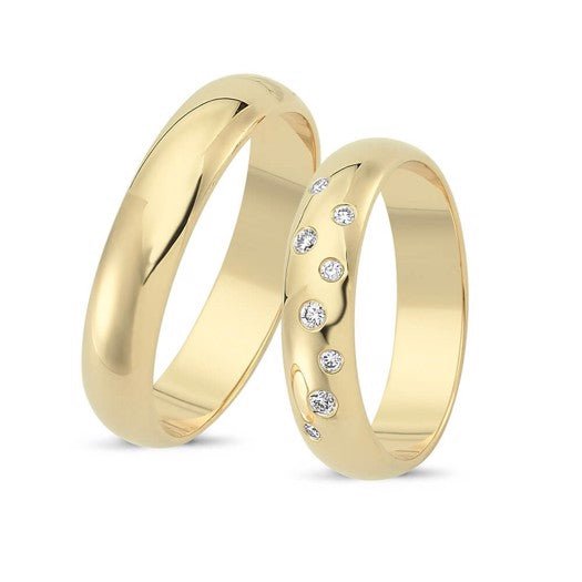 Flotte Nuran vielsesringe i 14 kt guld med 8 diamanter på 0,11 ct